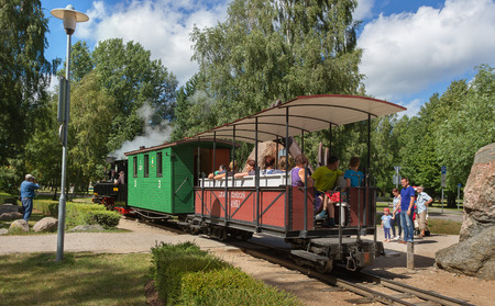 VENSPILS, JULY 31: Venspils is a town in northwestern Latvia. Tourist train departs from the station in Venspils city park on 31 July 2016, Latvia.のeditorial素材