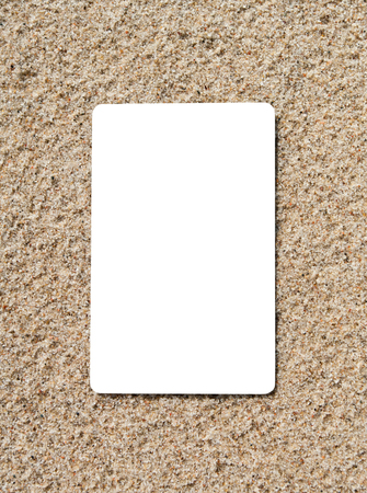 Square like credit card isolated on sand surface.の写真素材