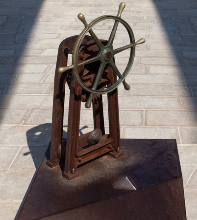 Monument of metal handweel on the street.