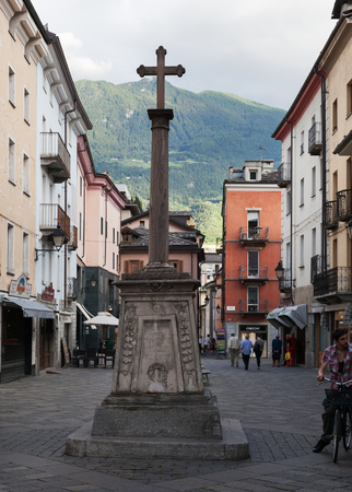 ITALY, AOSTA - JULY 5: Aosta is located region in the Italian Alps. View to the city in evening time on 5 July 2018 Aosta, Italy.のeditorial素材