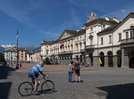 ITALY, AOSTA - JULY 8: Aosta is located region in the Italian Alps. View to the central square of city in morning time on 8 July 2018 Aosta, Italy.のeditorial素材