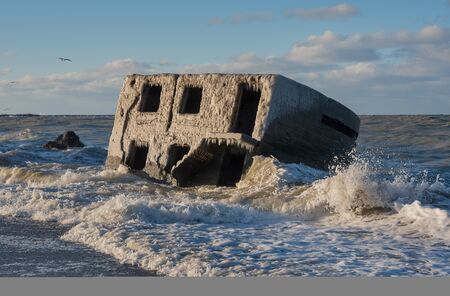 Ruins of northern forts on the beach of Baltic sea in Liepaja, Latvia.