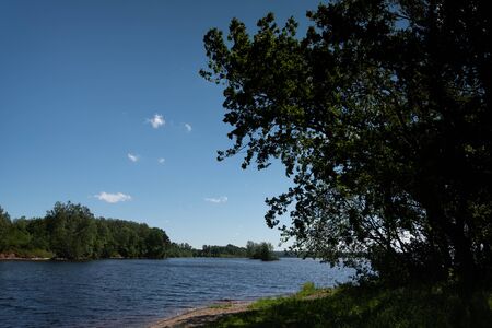 View from coast to wide river.