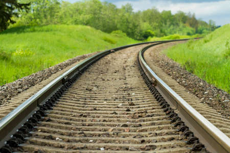 View to curve railroad on a countryside.の写真素材