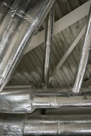 Construction of ventilation pipes on the ceiling.の写真素材