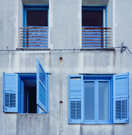 Buildings with blue shutters in Trapani, Sicily.の写真素材