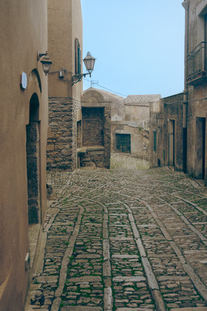 A traditional narrow stone lane in Erice.の写真素材