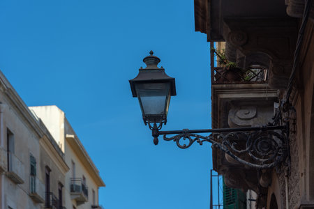 Light and shadow, lamps in Italy.の写真素材