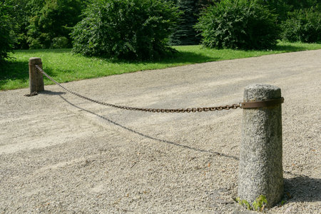 Old territory barrier with big chain.の写真素材