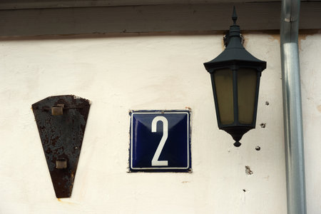 The second number on the wall of the old house.の写真素材