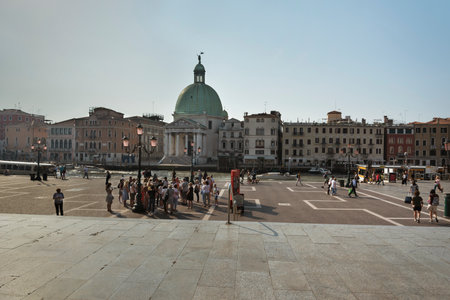 ITALY, VENICE - JUNE 16: Venice is a city in the northeast of Italy. View of the canal and buildings from train station on a sunny day June 16, 2022, Venice, Italy.のeditorial素材