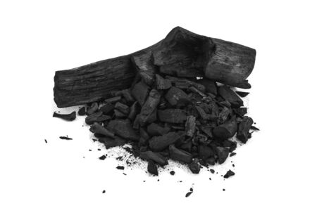 Charcoal and Charcoalpowder on white background.の写真素材
