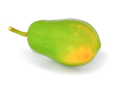 yellow and green papaya on white background.の写真素材