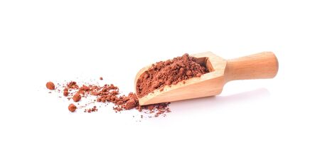 pile cocoa powder on white background.の写真素材