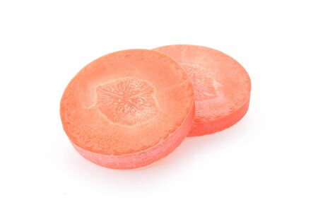 Carrot slices on white background.の写真素材