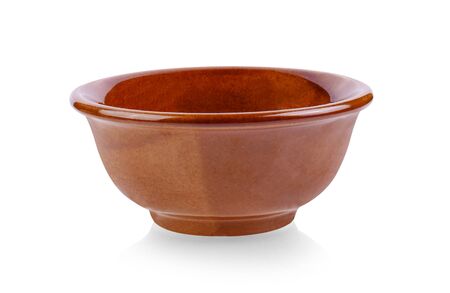 Brown ceramic bowl isolated on white background.の写真素材