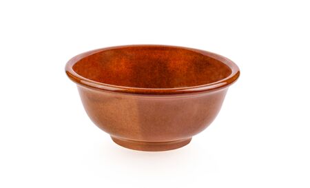 Brown ceramic bowl isolated on white background.の写真素材