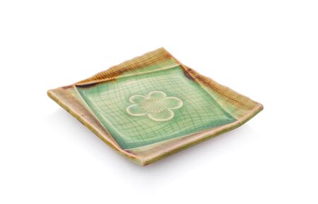 Ceramic plate on white background.の写真素材