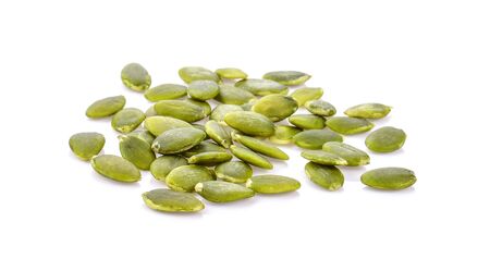 Pumpkin seeds on white background.の写真素材