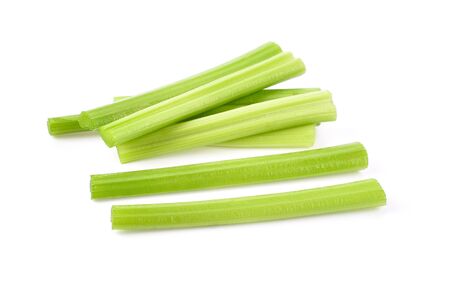 heap of sliced celery on white background.の写真素材