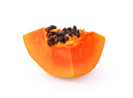 papaya fruit with seeds isolated on white background.の写真素材