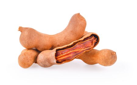 fresh tamarind fruits on white background.の写真素材