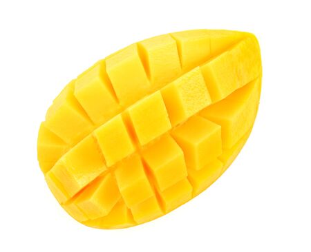 Ripe yellow Mangoes cut half in cubes isolated on white background.の写真素材