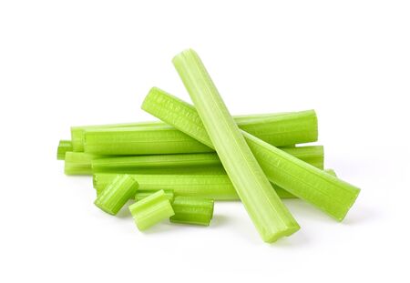 heap of sliced celery on white background.の写真素材