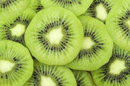 beautiful kiwi fruit slices background.の写真素材