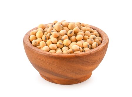 Soybeans in wooden bowl on white background.の写真素材