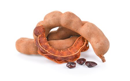 fresh tamarind fruits isolated on white background.の写真素材