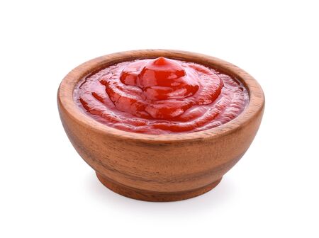 tomato sauce in a bowl on white background.の写真素材