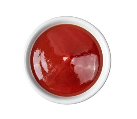 tomato sauce in a bowl on white background.の写真素材