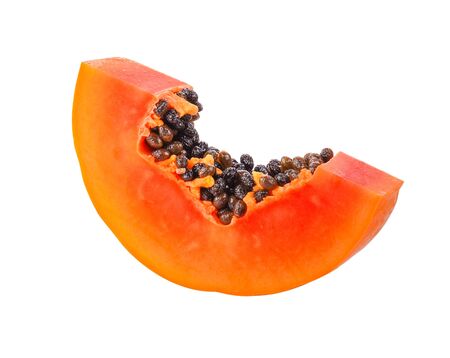 half of ripe papaya fruit with seeds isolated on white background.の写真素材