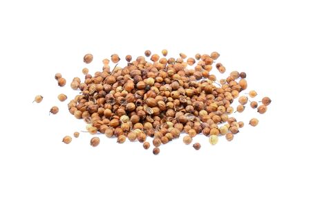 Coriander seeds isolated on white backgroundの写真素材