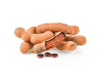 fresh tamarind fruits isolated on white background.の写真素材