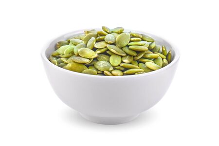 Pumpkin seeds on white background.の写真素材