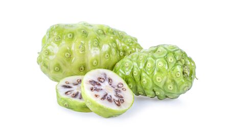 Noni or Morinda Citrifolia fruits with sliced isolated on white backgroundの写真素材