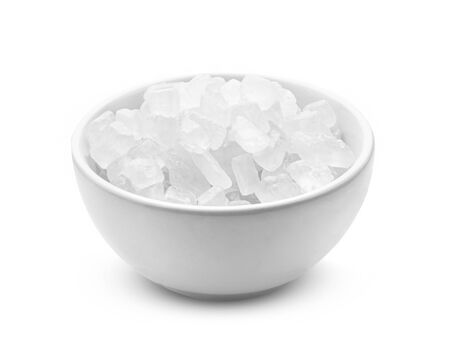 rock sugar in bowl on white background.の写真素材