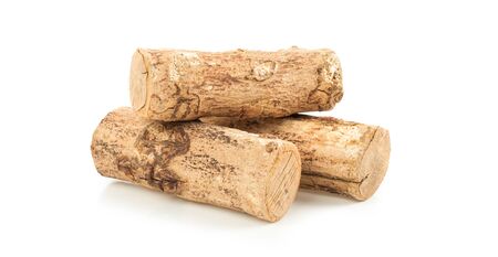 Thanaka wood on white background.The face to make a beautiful white face.の写真素材
