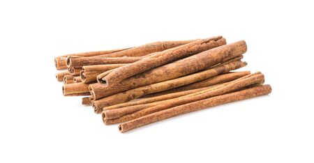 Cinnamon sticks isolated on white background.の写真素材
