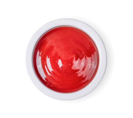 tomato sauce in a bowl on white background.の写真素材