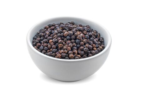 Black pepper on white background.の写真素材