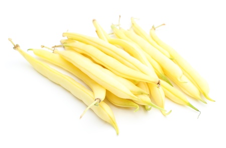 Closeup of fresh yellow beans isolated on white backgroundの写真素材