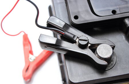 Charger with cables uses to charge dead car batteryの写真素材