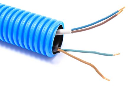 Corrugated plastic pipe and electrical cableの写真素材