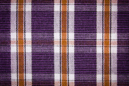 Colorful checkered shirt as background texture, multicolored fabric as backdrop