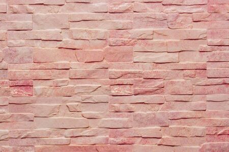 Closeup of stone wall as background, brick wall texture
