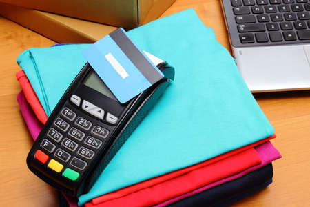 Use payment terminal with contactless credit card with NFC technology for paying for purchases in...