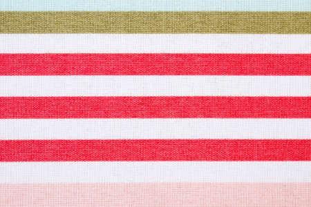 Colorful fabric as background, striped tablecloth texture as backdropの写真素材
